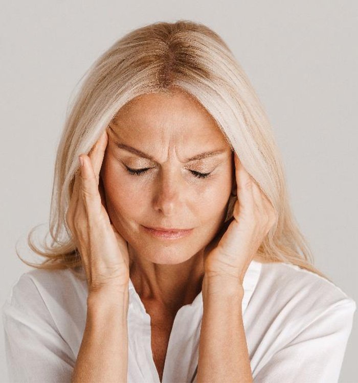 Woman suffering from a tension headache