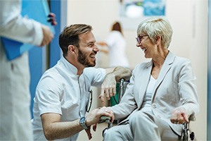 An orthopedist speaking with his patient