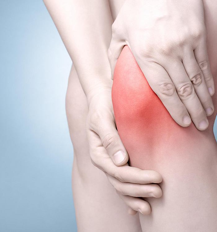 Close-up of person’s painful knee