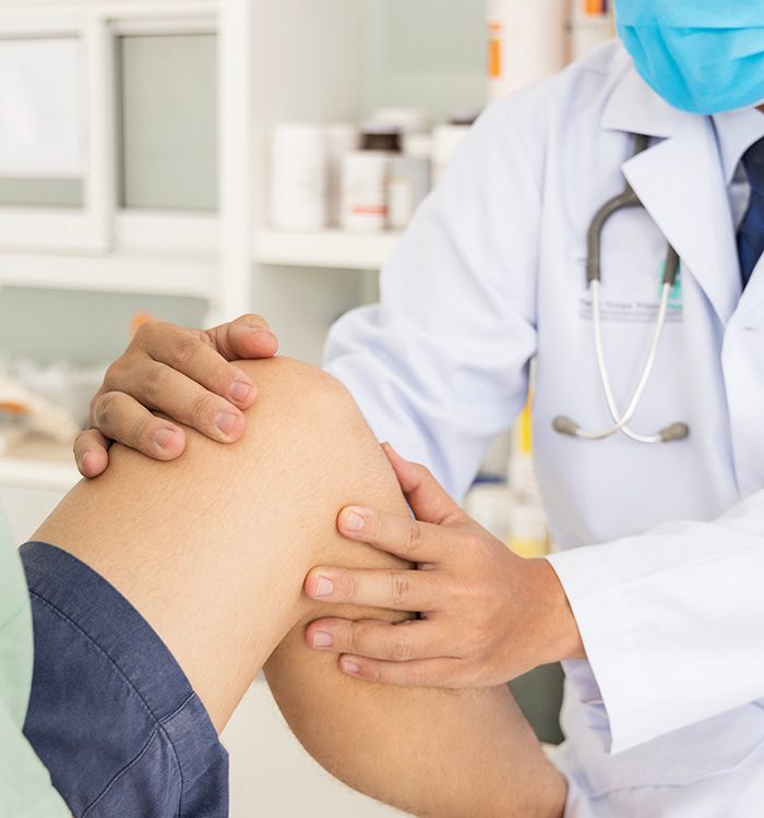 Doctor performing orthopedic examination